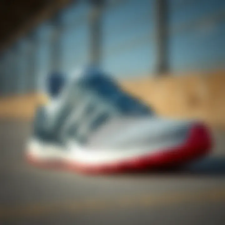 A close-up view of a pair of Adidas running shoes showcasing their innovative design and cushioning technology