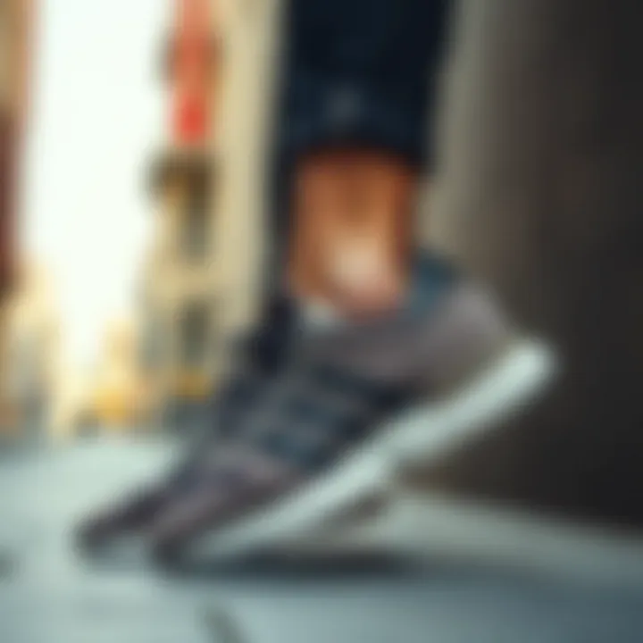 A stylish individual wearing Adidas ZX shoes in an urban setting.