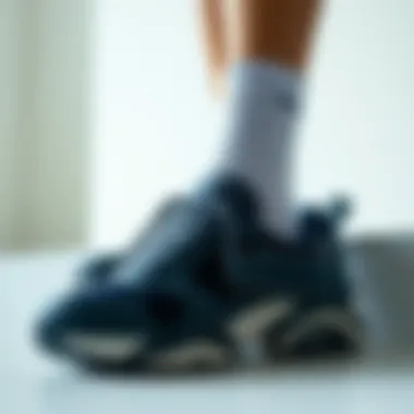 Stylish AMG shoes displayed in a minimalistic fashion setting