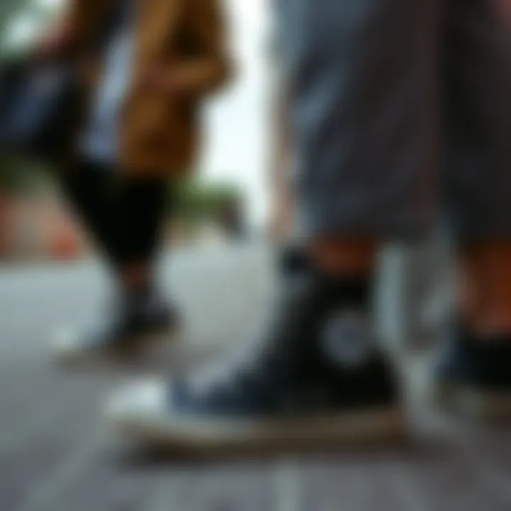 Fashionable outfit combination featuring Converse high-tops in black