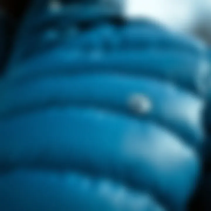 Close-up of the luxurious fabric of a blue goose down jacket