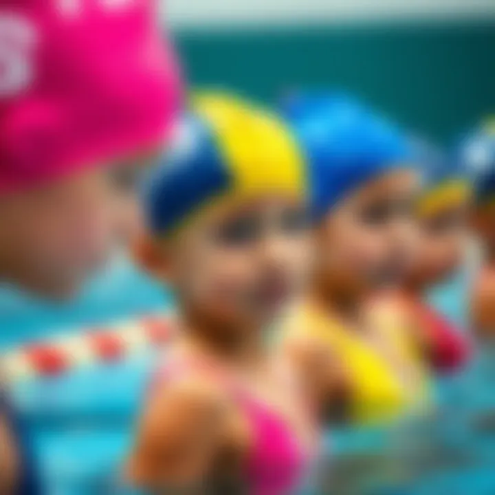Colorful swim caps for children during a training session